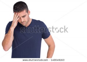 stock-photo-sad-man-holding-his-forehead-in-white-background-140049163